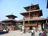 Kathmandu Patan Durbar Square 23 Vishwanath Temple and Bhimsen Temple With Lion Column 